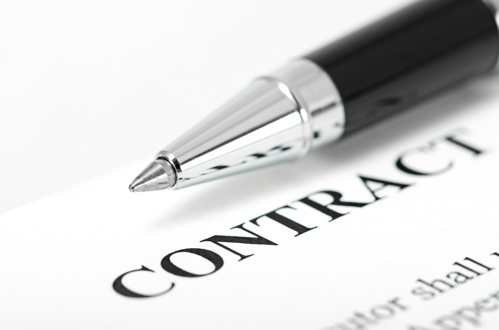 Why should a lawyer be hired to draft a contract